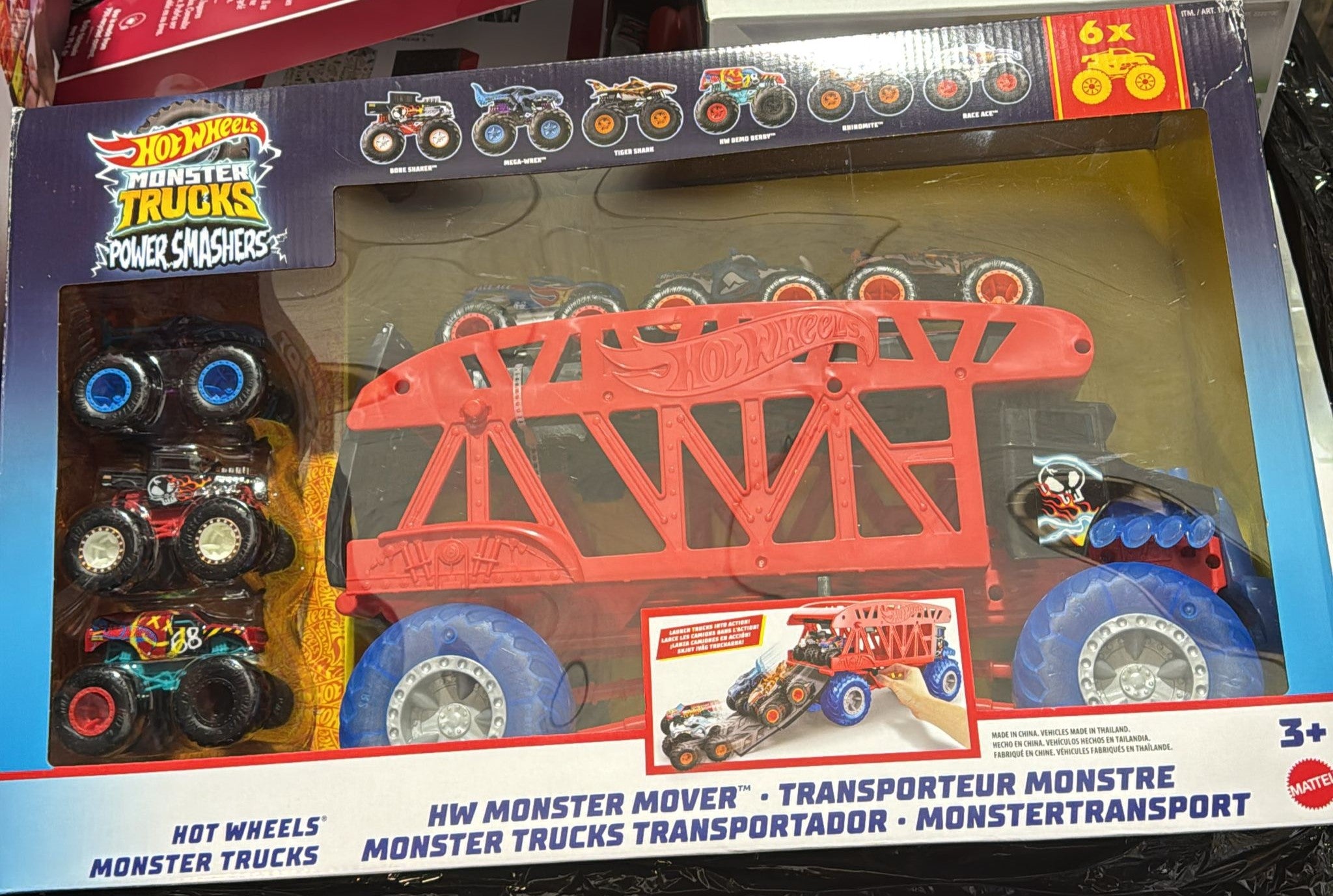 Hot Wheels Monster Truck Boneshaker Hauler with 6 Trucks