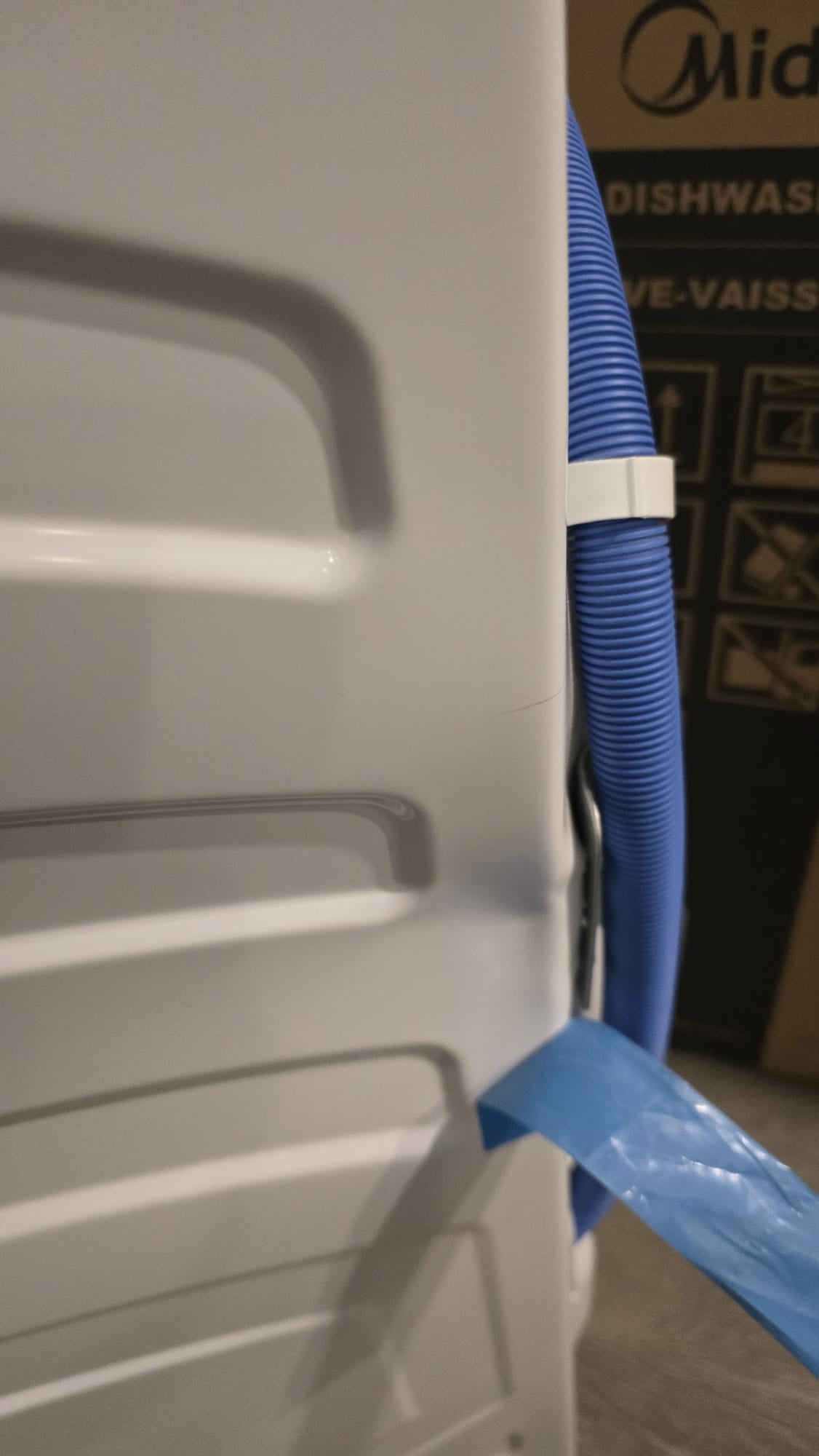 GE 5.5 cu ft. IEC Sapphire Blue Front Load Washer