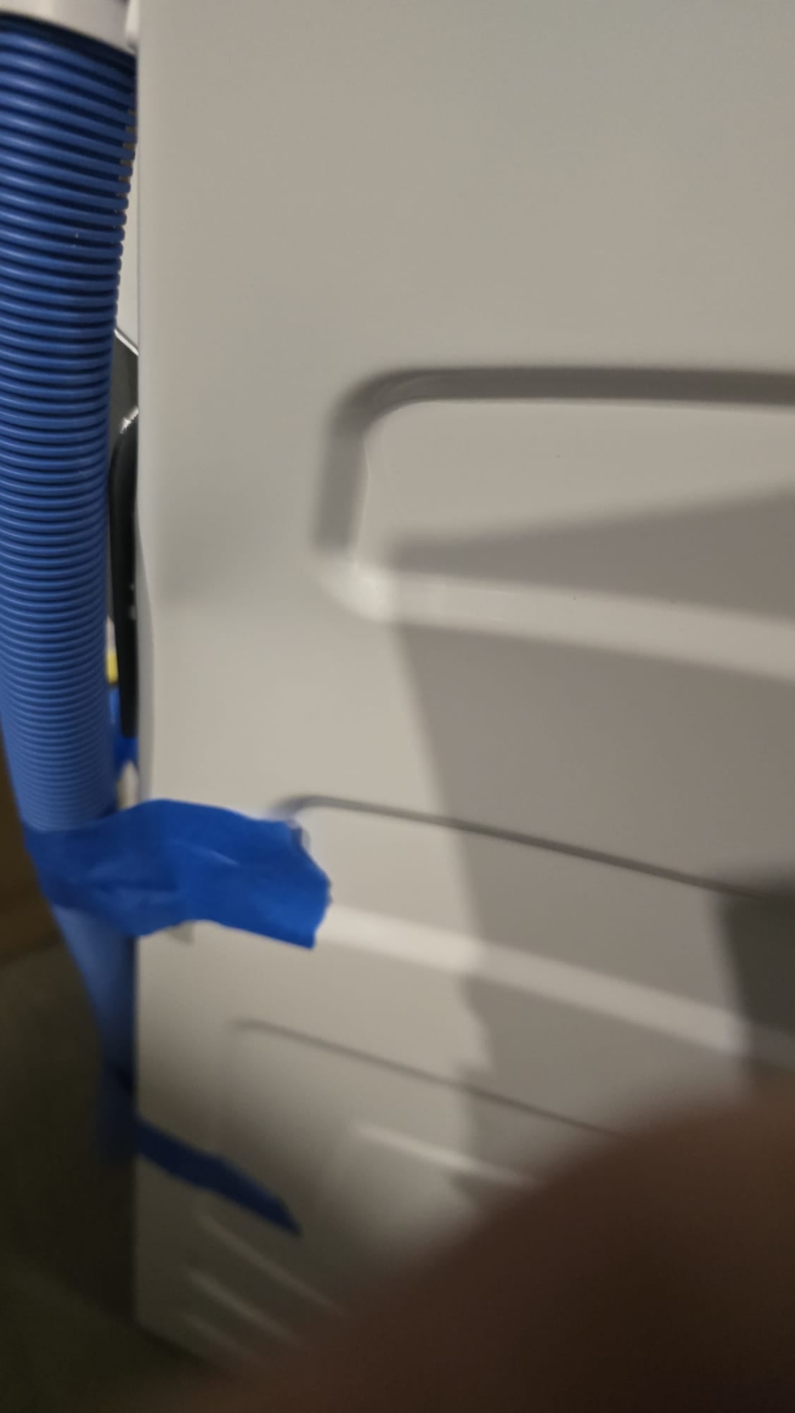 GE 5.5 cu ft. IEC Sapphire Blue Front Load Washer