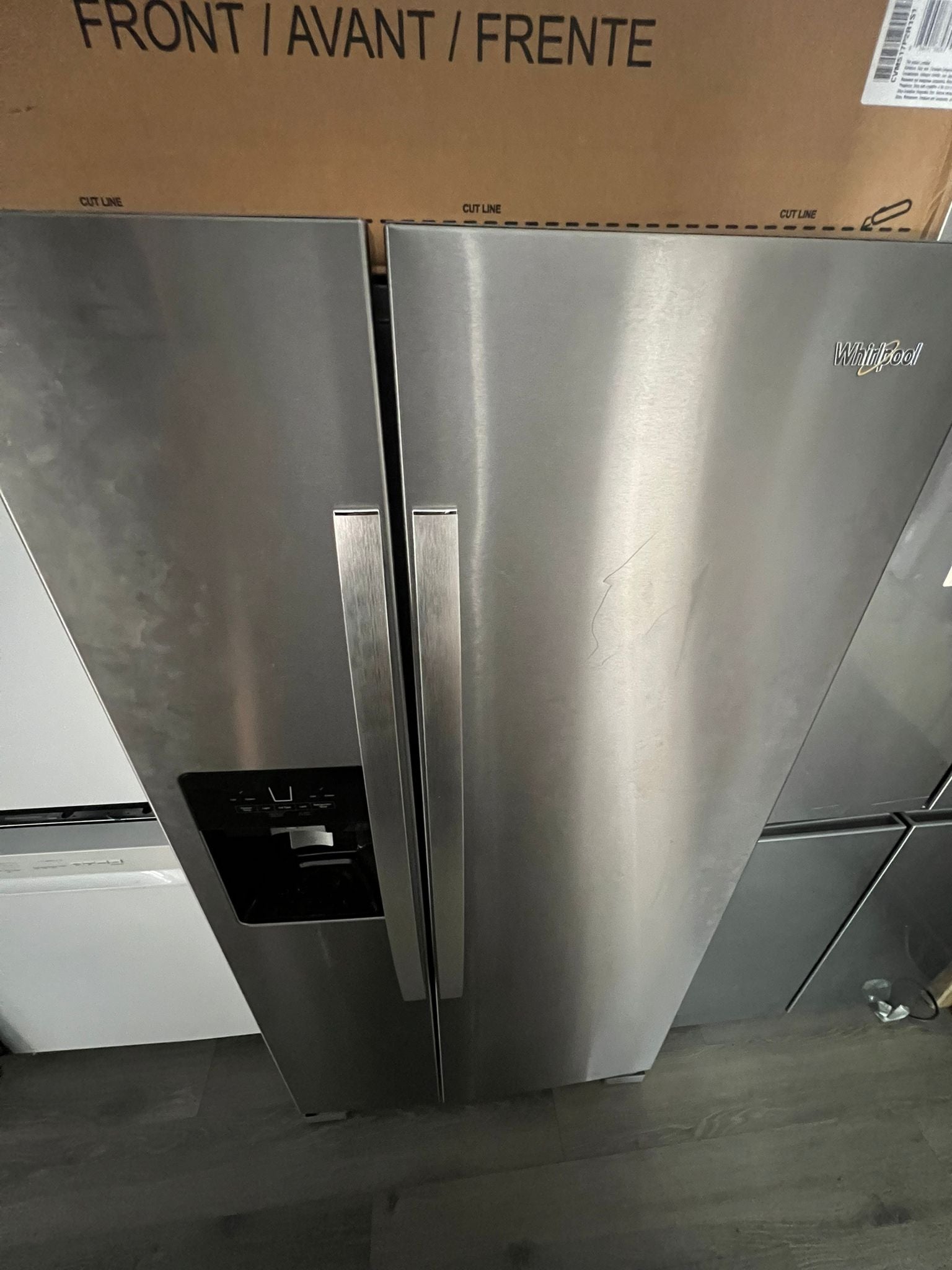 Whirlpool 33 in 21.4 cu ft. Side-by-Side Refrigerator with Exterior Ice and Water Dispenser (used)
